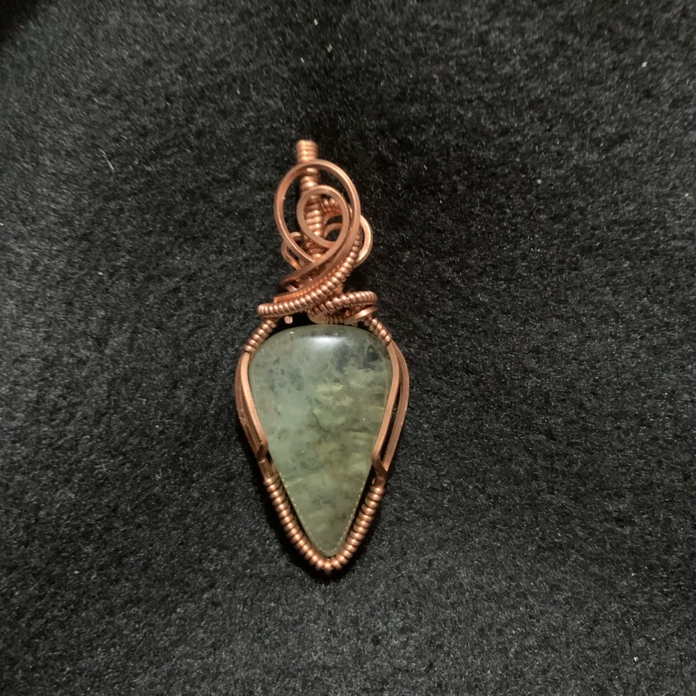 Hand crafted copper pendant.